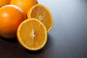 Oranges on dark background