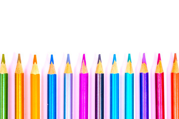 Set beautiful white , colored pencils of colored pencils on white background. Soon to school. Back...
