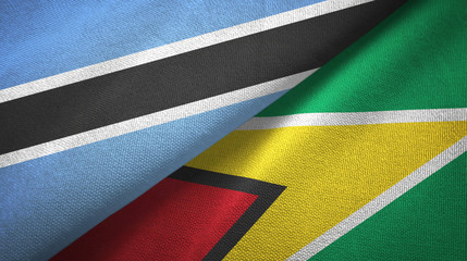 Botswana and Guyana two flags textile cloth, fabric texture
