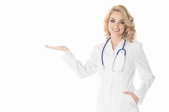 Doctor In White Coat Pointing With Hand