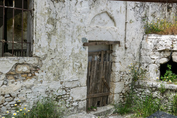 Fototapeta premium door of old abandoned village house