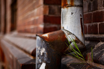 close up of the drain pipe on the wall