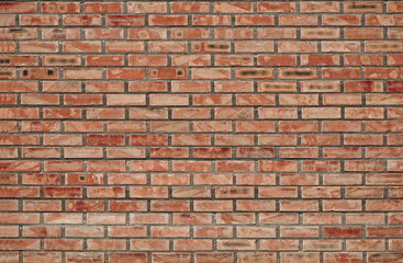 Bricks background and textures on the wall. Poor brick cracks. Slits Damage. Scratches.