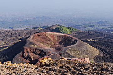 Amazing panoramic view of crater and area of Volcano Etna in Sicily, Italy in evening sunlight,...