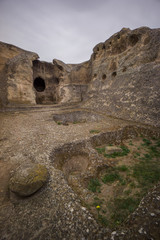 uplistsikhe detailed stone carvings of cave house floor