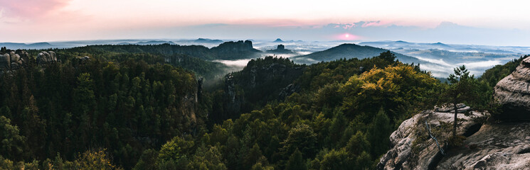 Panorama of mountains in fog