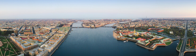 Obraz premium Panorama of the spit of Vasilyevsky island, Palace Square, the Hermitage, Peter and Paul Fortress and Petrograd Island.. Aerial view. The Neva river, St. Petersburg, Russia