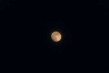 Full moon isolated on a black sky