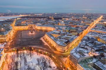 Aerial view of Palace Square and Alexander Column, the Winter Palace, the Hermitage, little people walks