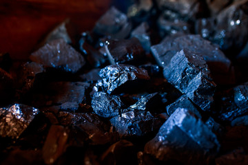Coal or carbon on the dark background. Coal closeup.