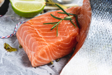 Raw and Fresh Salmon Fillet with Lime and Aromatic Herbs and Spices