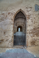 One of the side doors of the castle of Chipiona, (Spain)