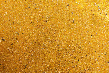 Shiny golden sand as background, top view