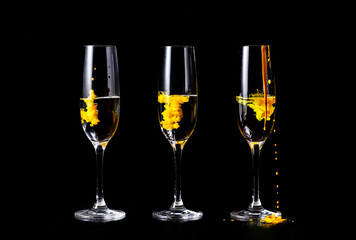 Color splashes in champagne glasses