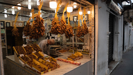 Palm dates shop in old market in Algeria