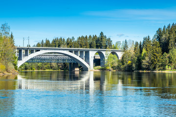 Spring landscape of bridge and Kymijoki river waters in Finland, Kymenlaakso, Kouvola, Koria