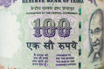 Macro detail on indian 100 Rupee bill
