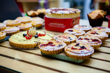 Various Different Types Of Sweet Cakes In Pastry Shop