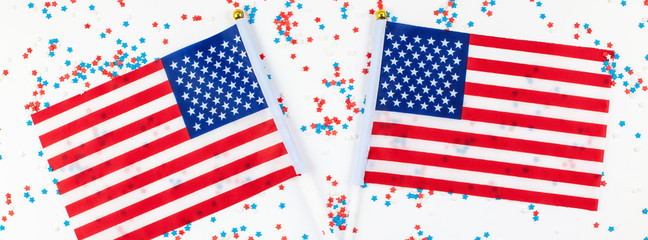 Fototapeta premium American flags on white background top view