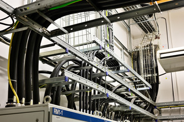 Cables placed on the cable rack in the interior.