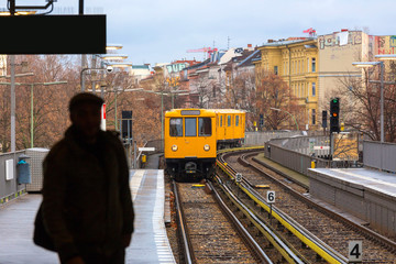yellow urban city train in berlin germany © Tobias Arhelger