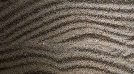 Sand surface with abstract patterns