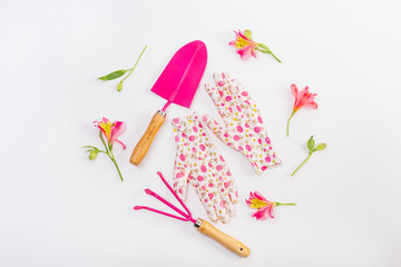 female set tools working garden pink flowers