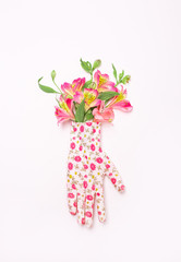 female set working garden pink gloves flowers