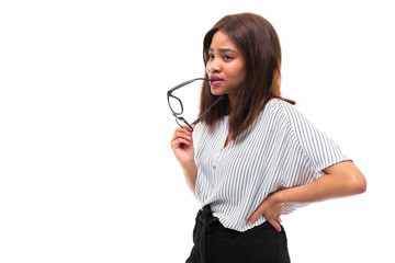 portrait of attractive young afro-american girl possing with glasses on background