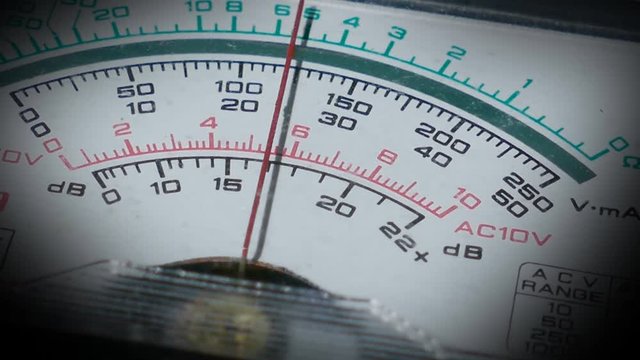 Analog multimeter measuring the voltage, tester tool