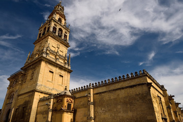 Fototapeta na wymiar North side of Cordoba Mosque Cathedral with minaret now bell tower of Our Lady of the Assumption church