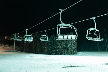 Chair lift at the winter mountain resort