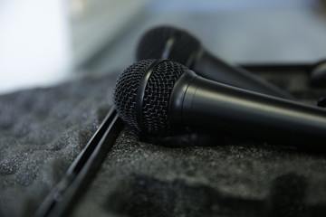Obraz premium microphone on gray background in soft focus blur