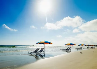 Foto op Canvas Beach chairs and parasols in Daytona Beach under a shining sun © Gabriele Maltinti