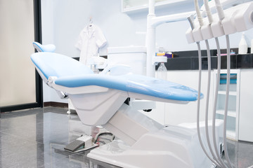 Dental chair and other accesries used by dentists in the office.
