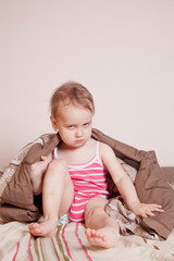 Little cute child girl getting ready to go to bed.  Sleeping time.