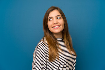 Obraz premium Young girl with striped shirt laughing