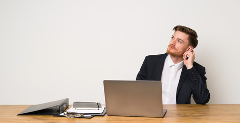Businessman in a office thinking an idea