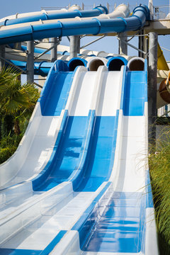 Steep Water Slide For Adults In Water Park.