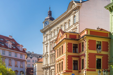Low angle street sunny view of European Buildings style in old town in Europe. Typical atmosphere of architectural element in Prague, Czech Republic.