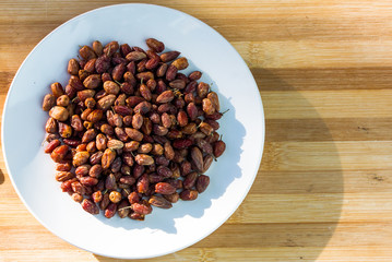 Sweet dried wild fruits from pink or red ivory tree known as nyii (Berchemia zeyheri)