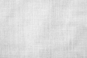 Fototapeta premium Hessian sackcloth woven texture pattern background in light white grey
