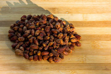 Sweet dried wild fruits from pink or red ivory tree known as nyii 