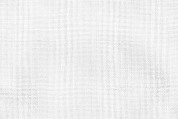 Fototapeta na wymiar Hessian sackcloth woven texture pattern background in white grey color