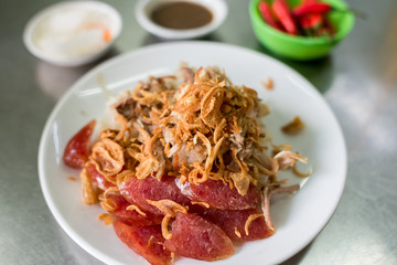 Close up of traditional Vietnamese cuisine of fried rice with wurst