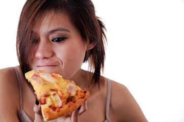 Happy woman eating tasty pizza.