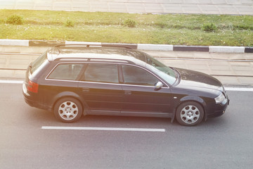 Passenger car black in the city