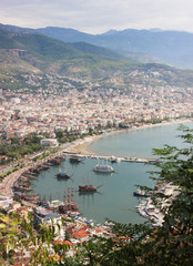 Fototapeta premium Alanya, Turkey. View on the city, sea, boats and fortress