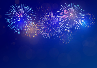 Fototapeta na wymiar colorful fireworks vector on dark blue background with sparking bokeh