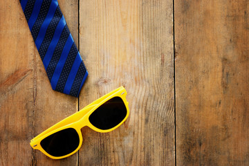 Father's day concept. Necktie over wooden background. top view, flat lay